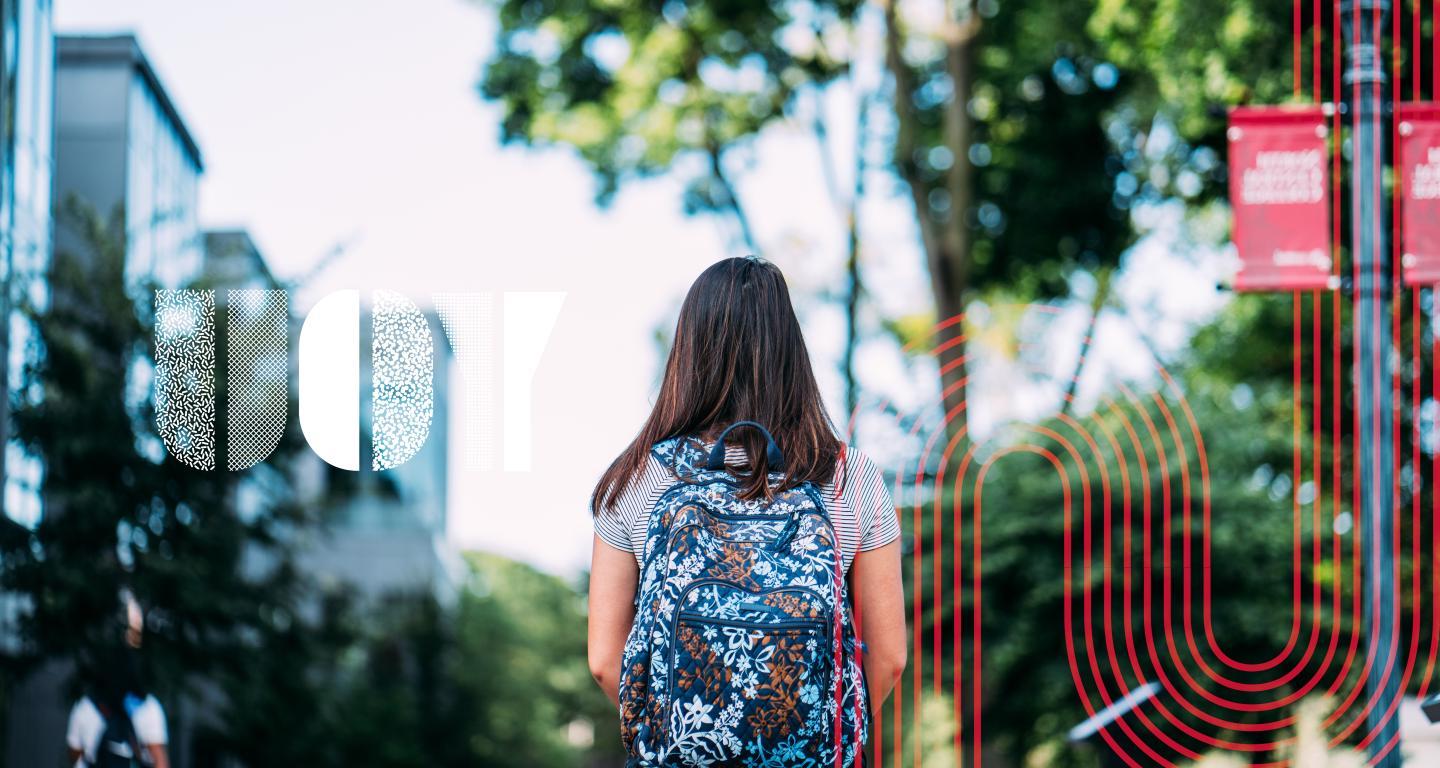 student walking on campus